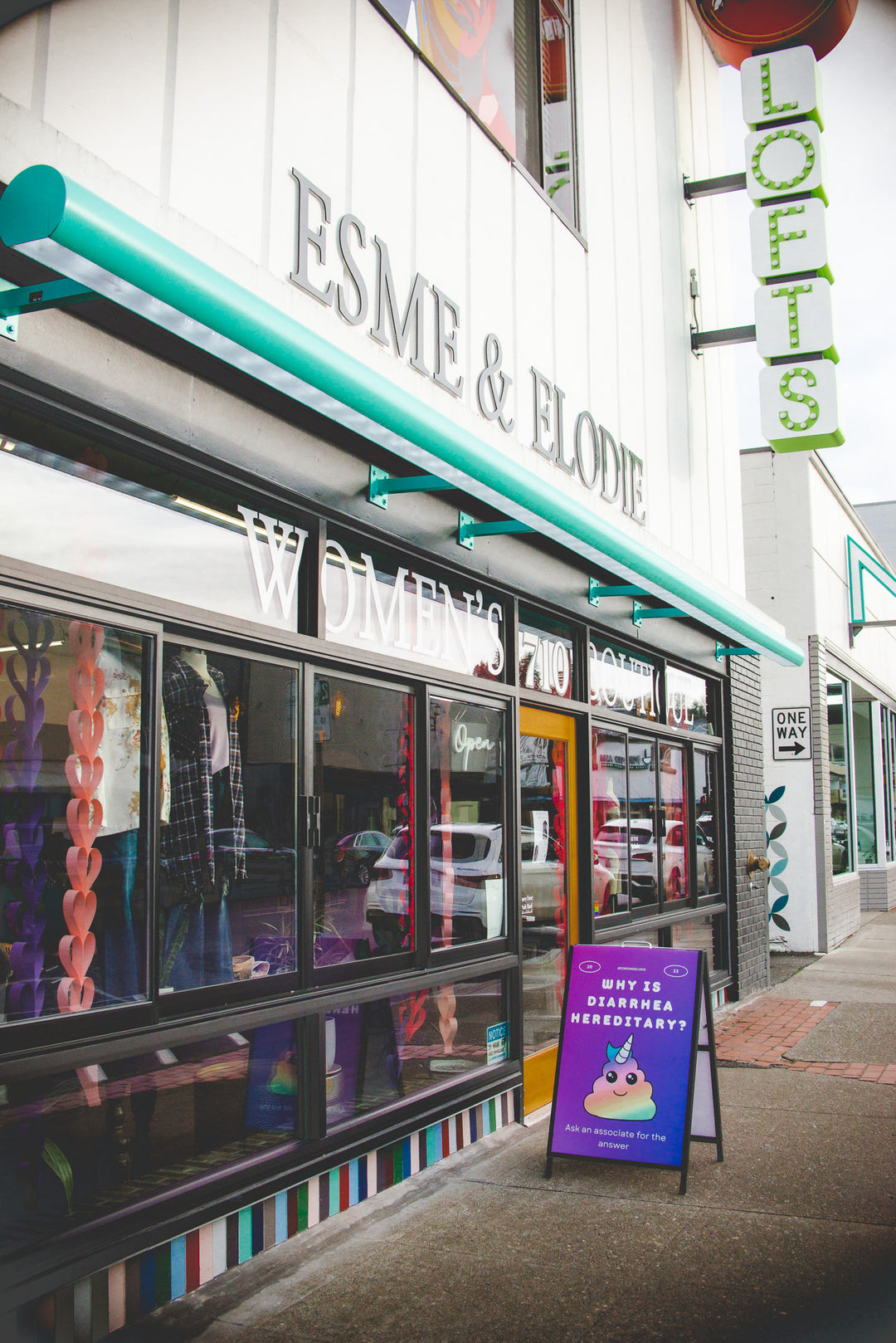 online boutique women plus size store with large windows retro lightbar in old jc penney building in downtown renton