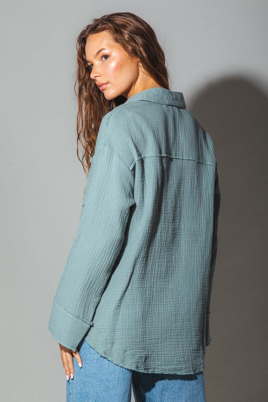 Women Frayed hem detail solid woven shirt top in sea blue