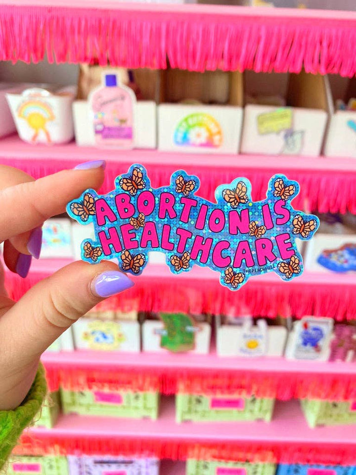 The Peach Fuzz - Abortion Is Healthcare Glitter Sticker