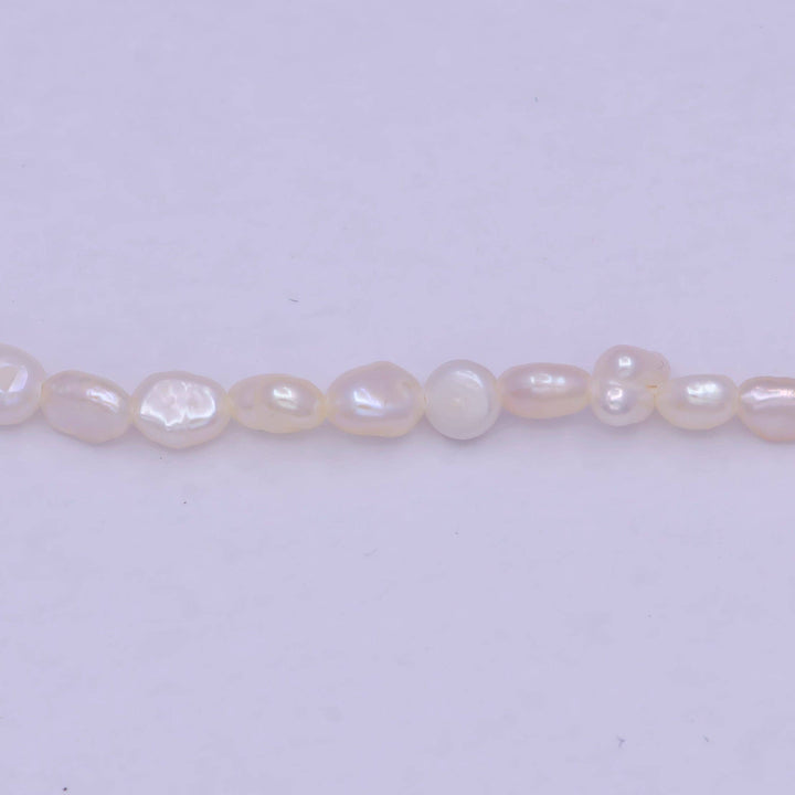 Aim Eternal - Irregular freshwater pearl necklace