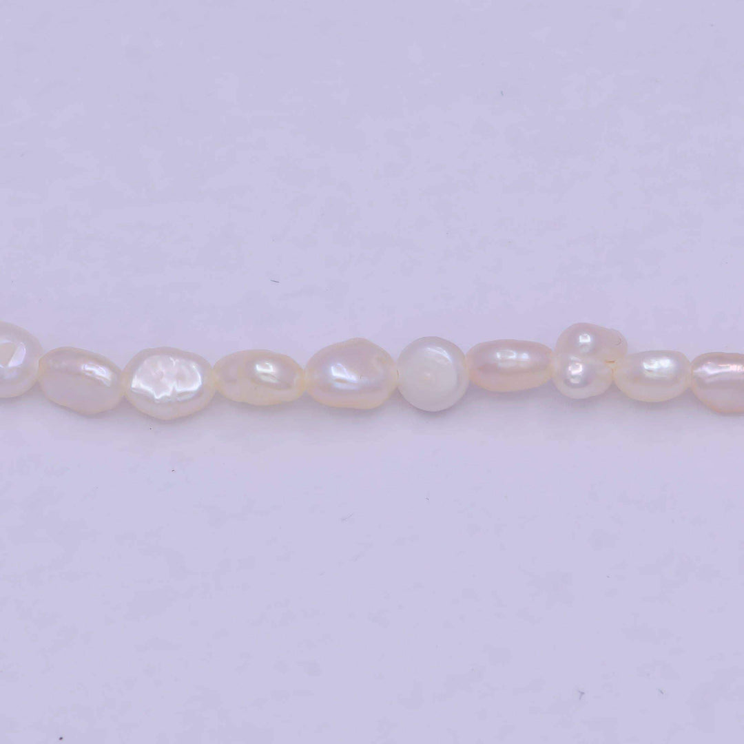 Aim Eternal - Irregular freshwater pearl necklace