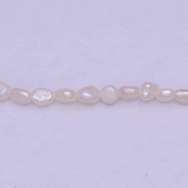 Aim Eternal - Irregular freshwater pearl necklace