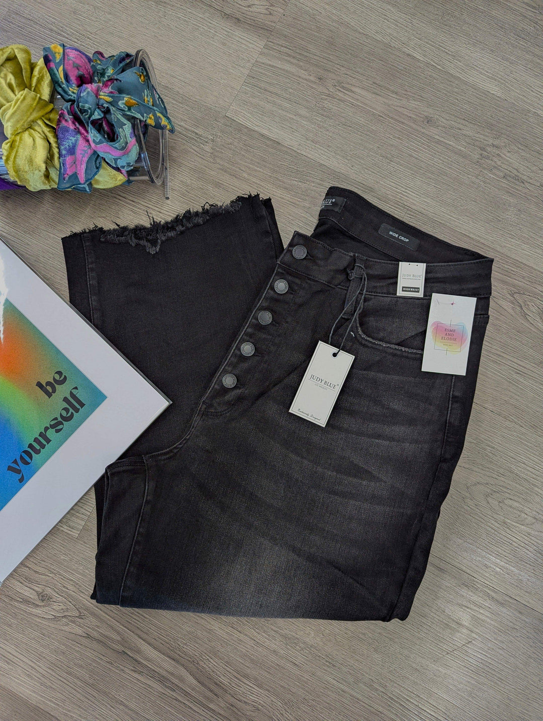 crop judy blue plus size jeans laying on floor folded in half