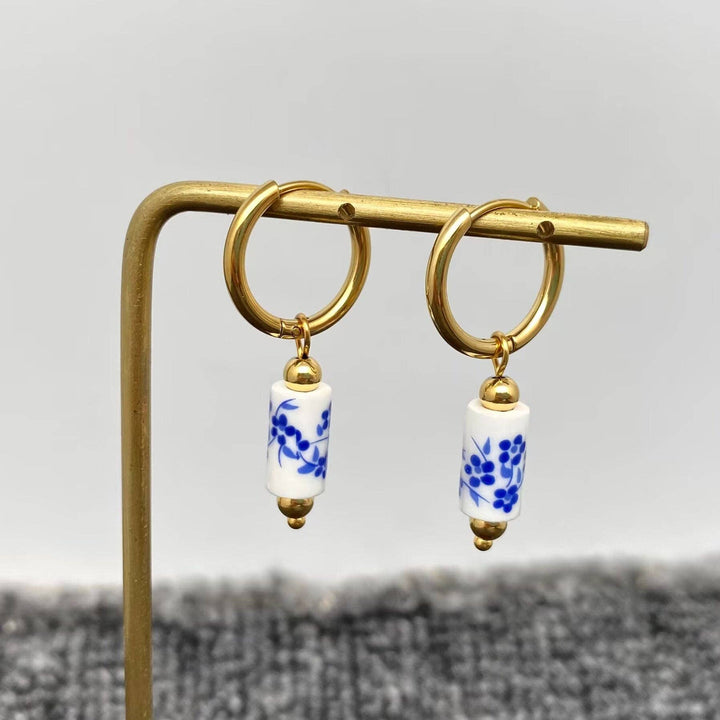 Mio Queena - Blue and White Porcelain 18K Golden SS Huugie Earrings - FGS: A