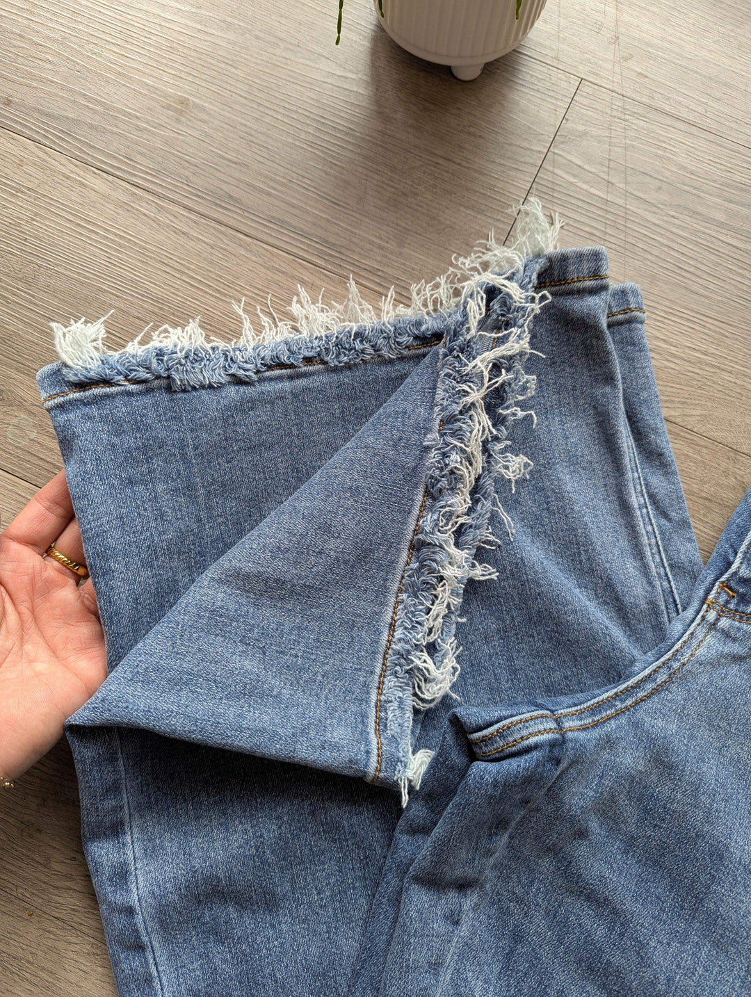 zoomed in distressed hem wide leg judy blue jeans