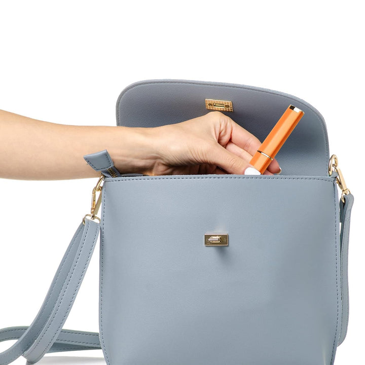 portable nail file hand putting in his purse