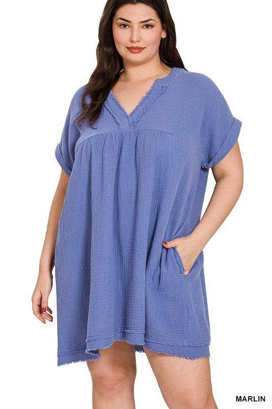 woman wearing vneck cotton dress hand in pocket in marlin blue