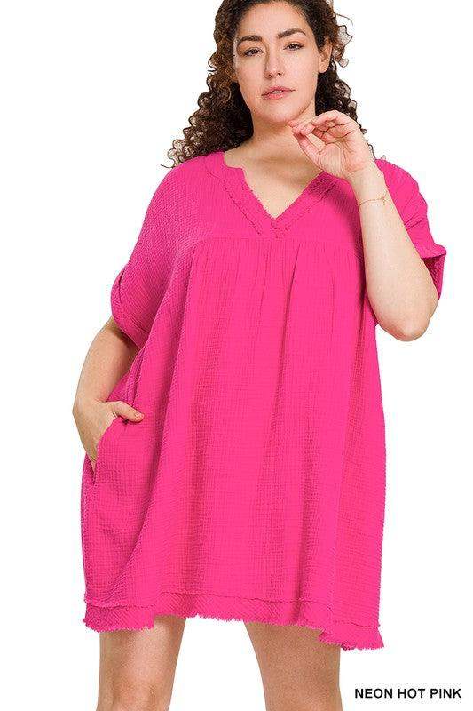 plus size woman wearing summer cotton short dress with hand in pocket