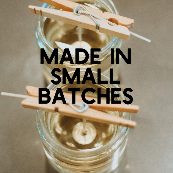candle wicks with paperclips showing small batch candle maker pouring candles
