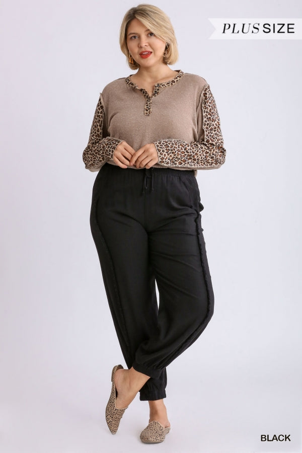 Plus size linen blend jogger in black with pockets and frayed edge