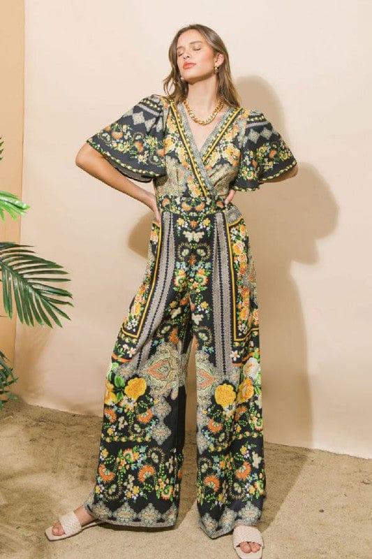 Black and citrus jumpsuit with deep v front and back - Esme and Elodie