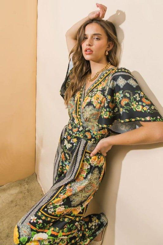 Black and citrus jumpsuit with deep v front and back - Esme and Elodie