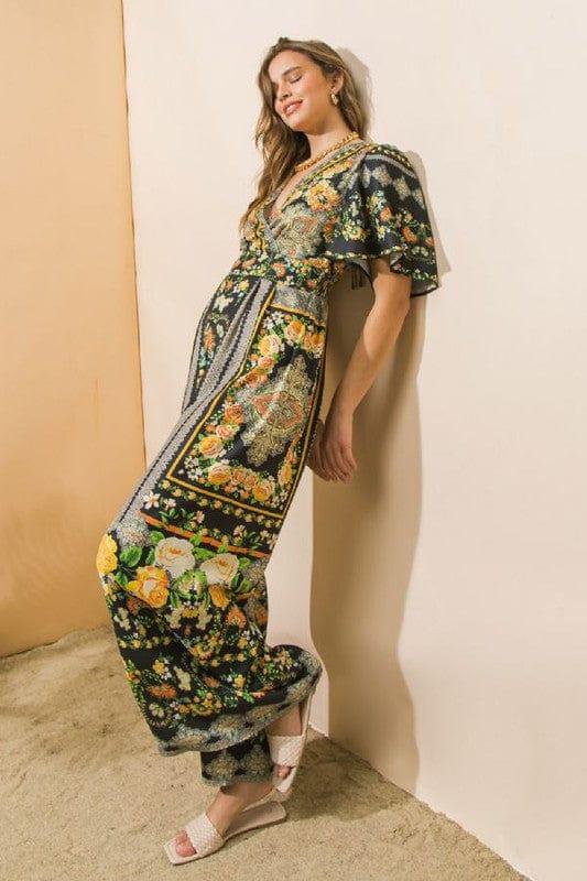 Black and citrus jumpsuit with deep v front and back - Esme and Elodie