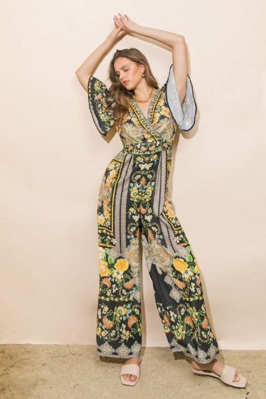Black and citrus jumpsuit with deep v front and back - Esme and Elodie