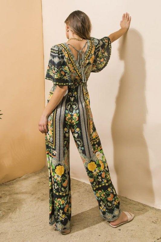 Black and citrus jumpsuit with deep v front and back - Esme and Elodie