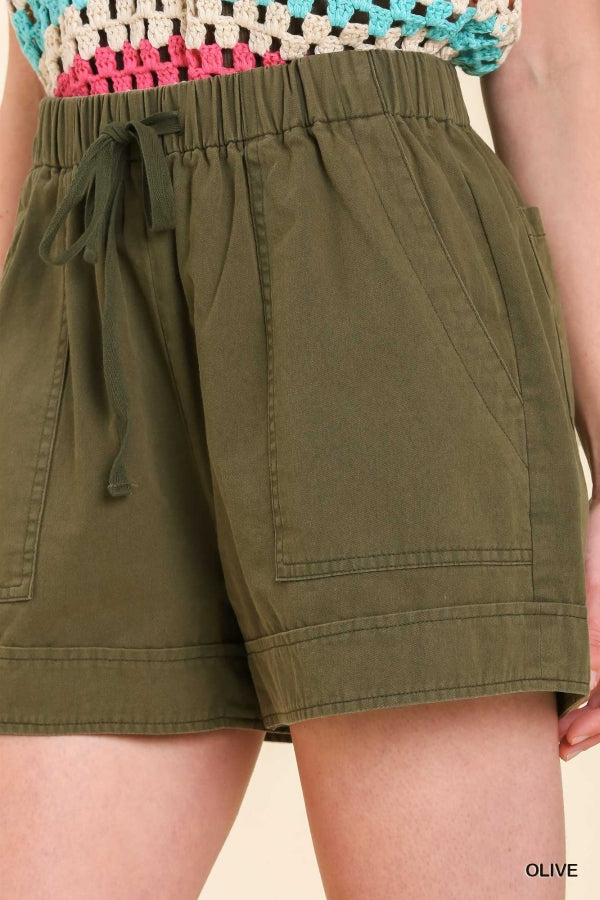 Women Umgee Mineral Wash Cargo Style High Waisted Pull On Cuffed Shorts with Drawstring, Elastic Waistband, & Front & Back Pockets in olive