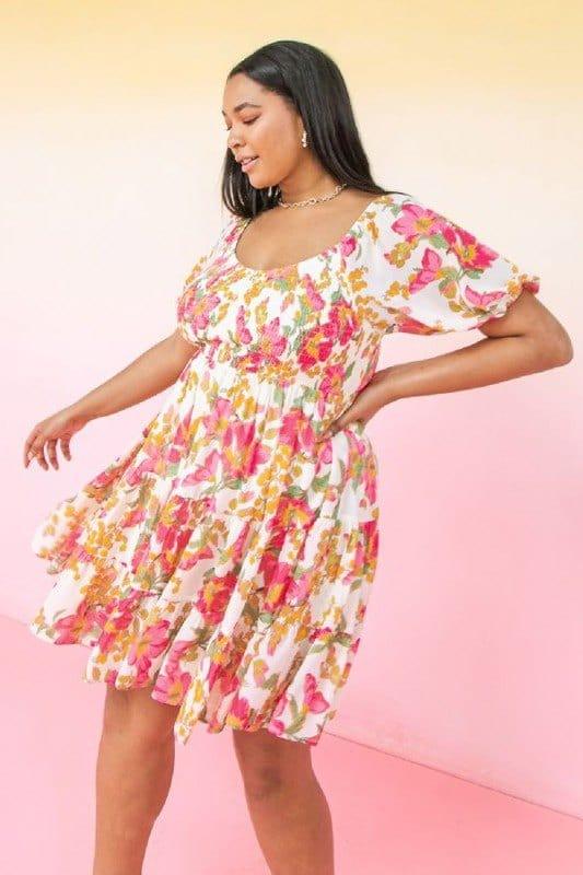 Plus size floral mini dress with vneck smocked bodice and peasant sleeve - Esme and Elodie