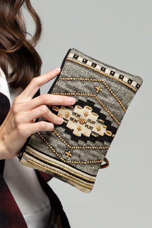 Reggine- handmade patterened clutch - Esme and Elodie